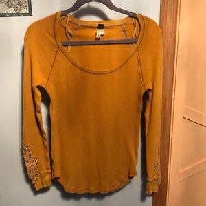 Free People mustard-orange top with sleeve detail